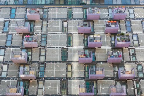 Re-cladding-work-in-progress-on-a-block-of-flats-in-Stratford-London-England-Shutterstock--492x328.jpg