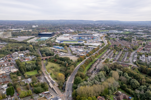 Holt-Town-Aerial-credit-Manchester-City-Council-crop-etihad-492x328.png